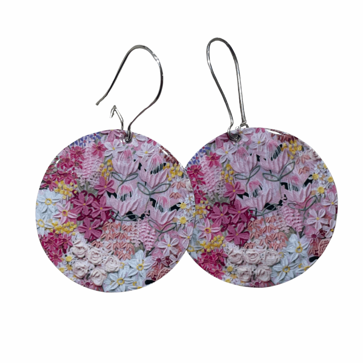 Floral patterned earrings on a white background