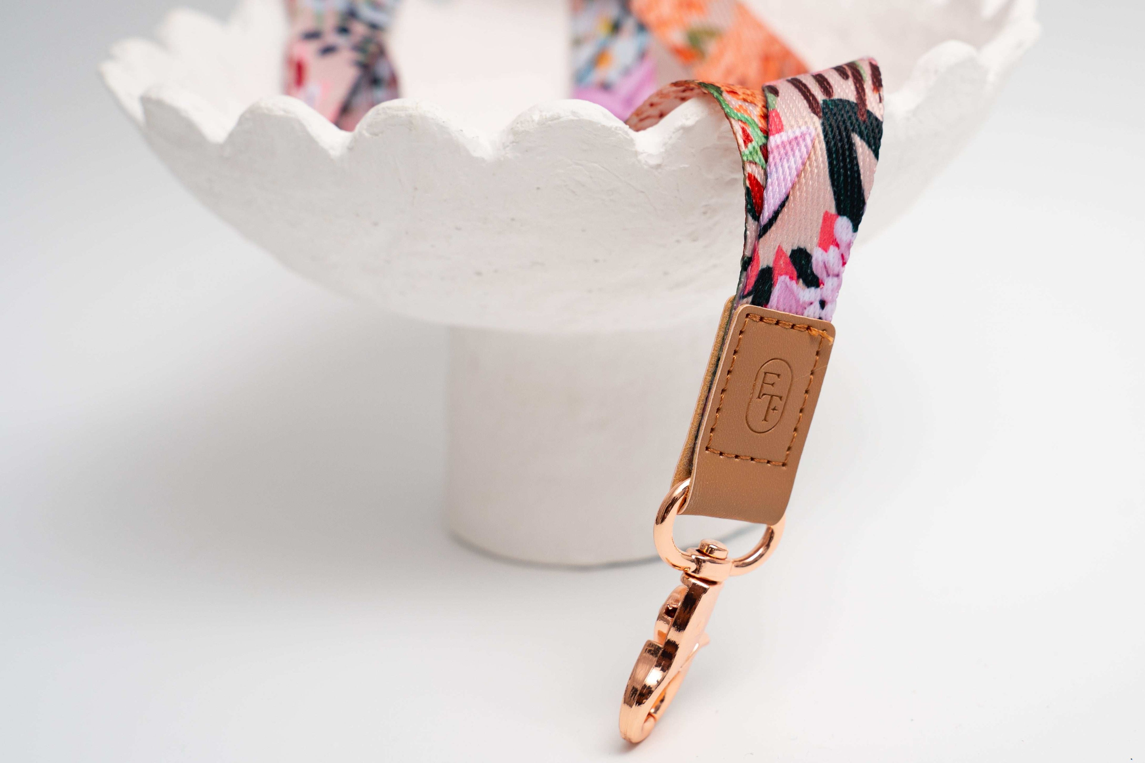 rose gold clasp and leather logo 