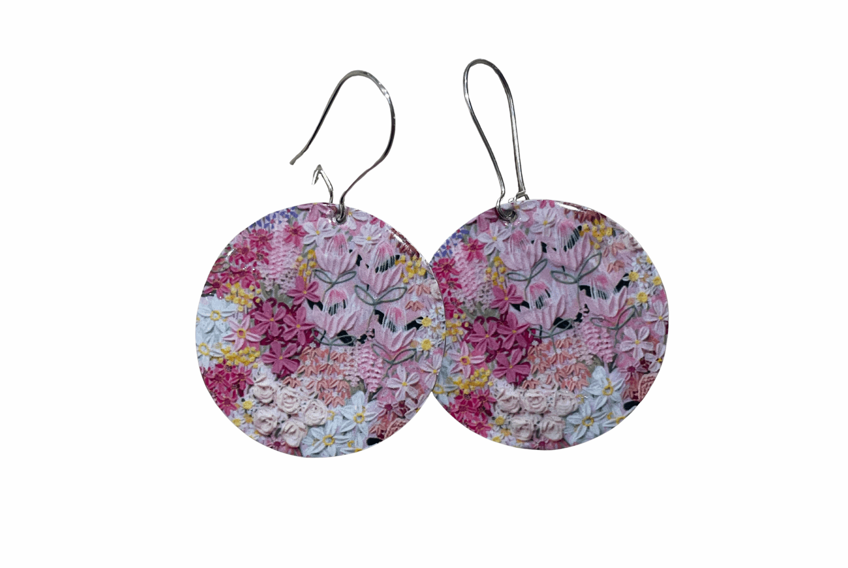 Floral patterned earrings on a white background